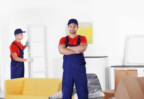 Movers planning access and loading for a Raynes Park property