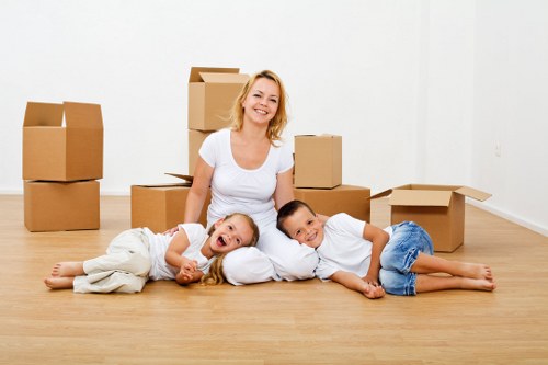 Household boxes and furniture being loaded for transport