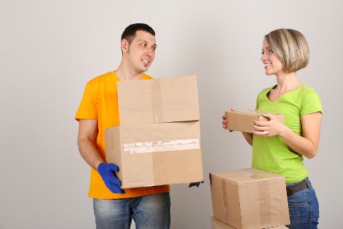 Office relocation team managing desks and IT equipment for a Raynes Park business